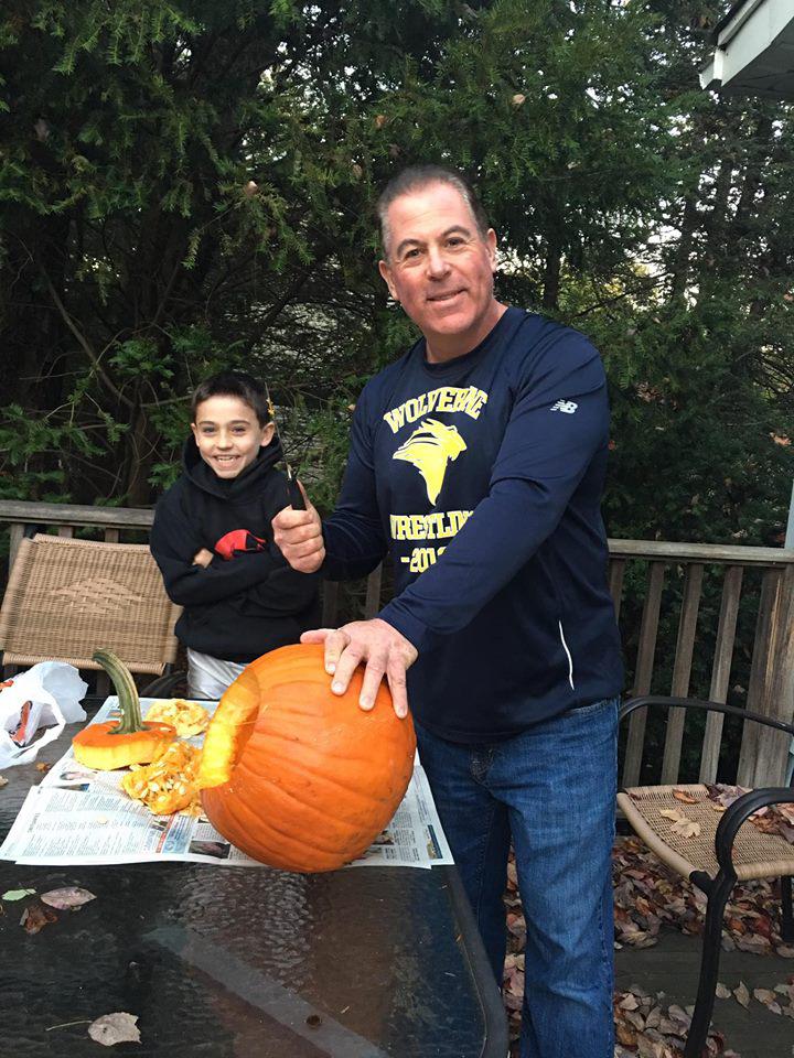 Mike Grey and his son smiling after class