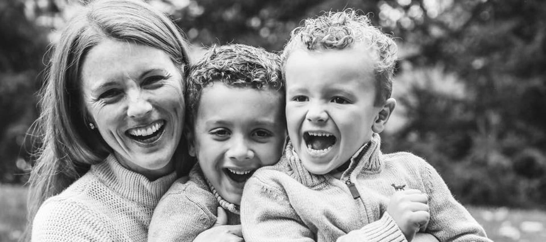 Lauren and her two kids smiling before their kids class